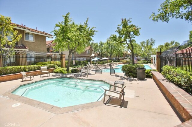 45 Via Hermosa, Rancho Santa Margarita, CA 92688 - community pool featuring a patio area