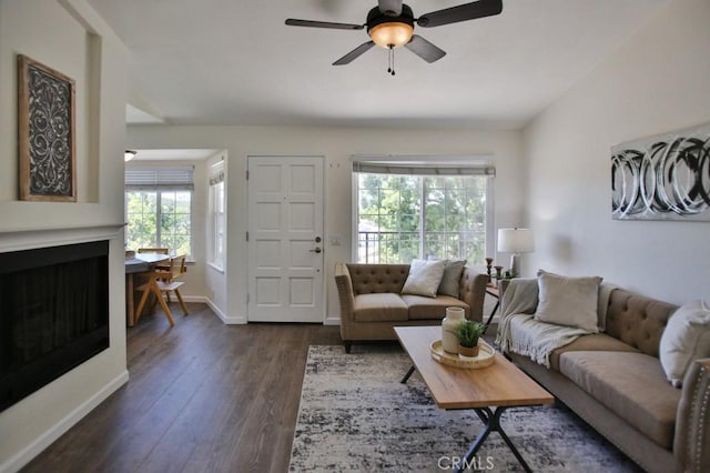 45 Via Hermosa, Rancho Santa Margarita, CA 92688 - living area with dark wood-style floors, a ceiling fan, baseboards, and vaulted ceiling