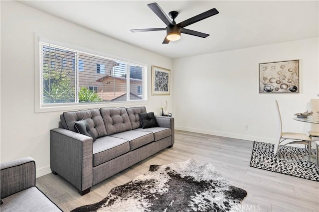 4429 Tremont St Unit 4, San Diego, CA 92102 - living room featuring light wood finished floors, a ceiling fan, and baseboards