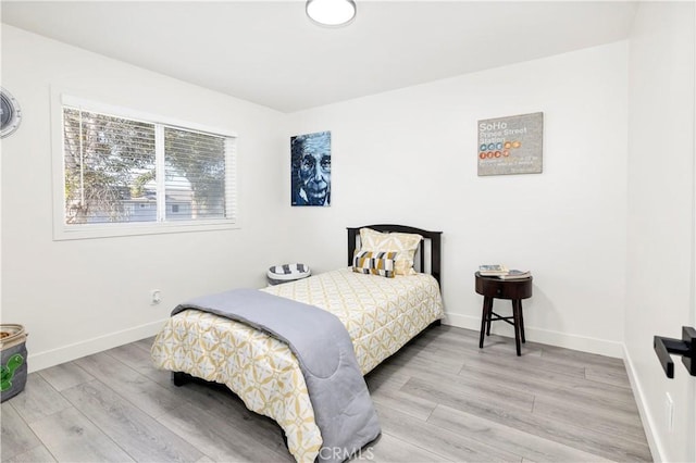 4429 Tremont St Unit 4, San Diego, CA 92102 - bedroom with wood finished floors and baseboards