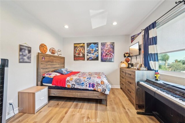 7906 Appaloosa Ct, Rancho Cucamonga, CA 91701 - bedroom featuring light wood-style flooring, baseboards, and recessed lighting