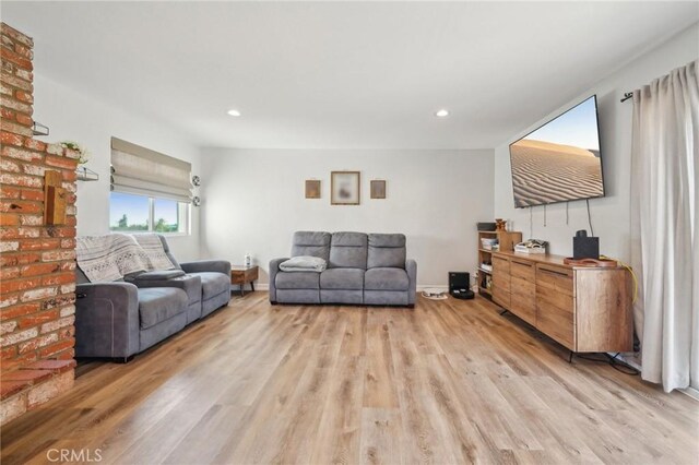 7906 Appaloosa Ct, Rancho Cucamonga, CA 91701 - living area with light wood finished floors and recessed lighting