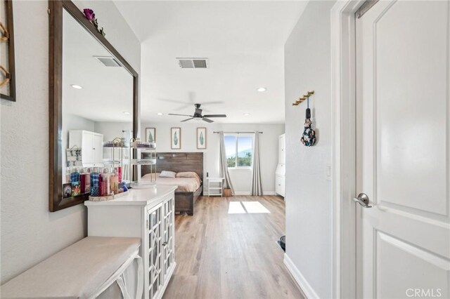 7906 Appaloosa Ct, Rancho Cucamonga, CA 91701 - hallway featuring light wood finished floors, recessed lighting, and baseboards