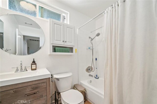 7906 Appaloosa Ct, Rancho Cucamonga, CA 91701 - bathroom with shower / bath combo, vanity, and toilet