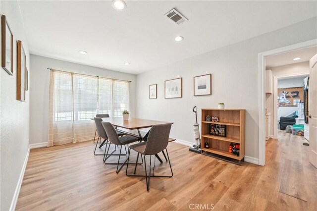 7906 Appaloosa Ct, Rancho Cucamonga, CA 91701 - dining space with light wood-style floors, baseboards, and recessed lighting