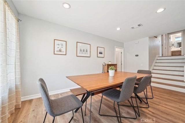 7906 Appaloosa Ct, Rancho Cucamonga, CA 91701 - dining area with stairway, baseboards, recessed lighting, and light wood-type flooring