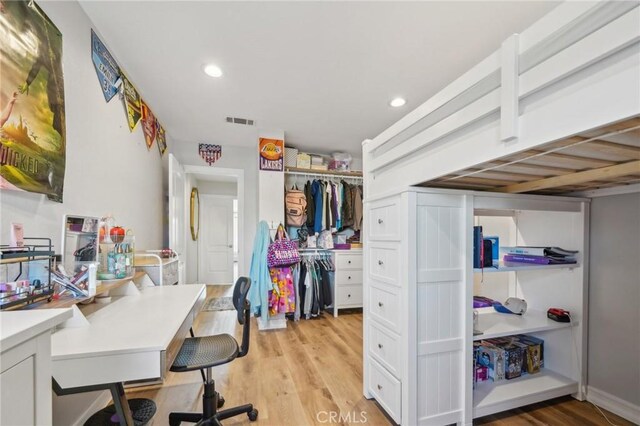 7906 Appaloosa Ct, Rancho Cucamonga, CA 91701 - office area with light wood-style floors and recessed lighting