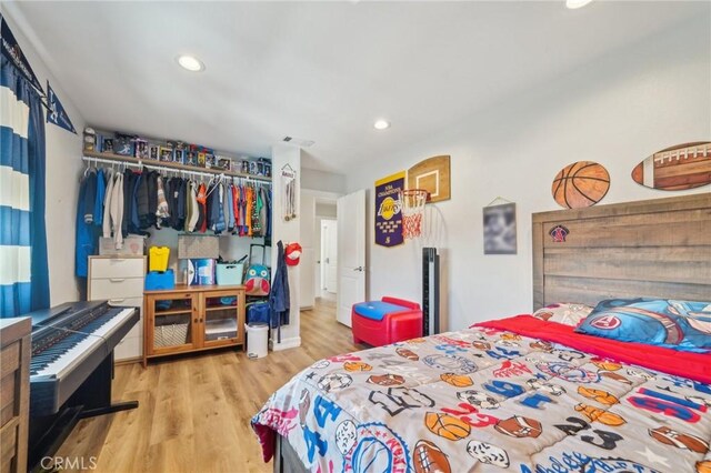 7906 Appaloosa Ct, Rancho Cucamonga, CA 91701 - bedroom featuring wood finished floors and recessed lighting