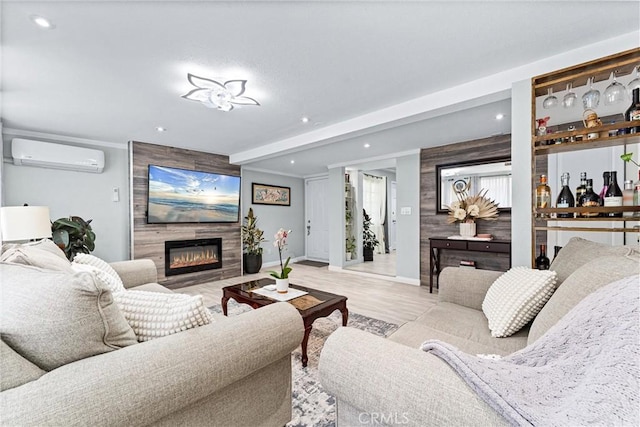 20402 Pioneer Blvd, Lakewood, CA 90715 - living room featuring a wall unit AC, a fireplace, baseboards, recessed lighting, and light wood-type flooring