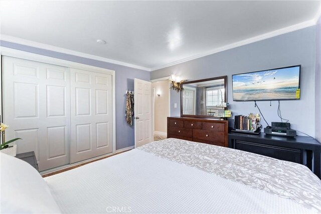 20402 Pioneer Blvd, Lakewood, CA 90715 - bedroom with a closet, ornamental molding, and baseboards
