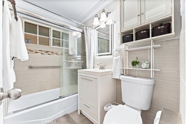 20402 Pioneer Blvd, Lakewood, CA 90715 - full bathroom with toilet, bath / shower combo with glass door, vanity, tile walls, and crown molding