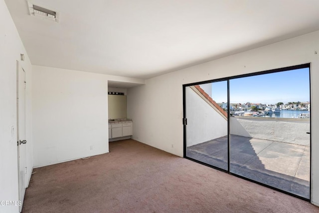 4320 Meridian Ave, Oxnard, CA 93035 - empty room featuring carpet floors and a water view
