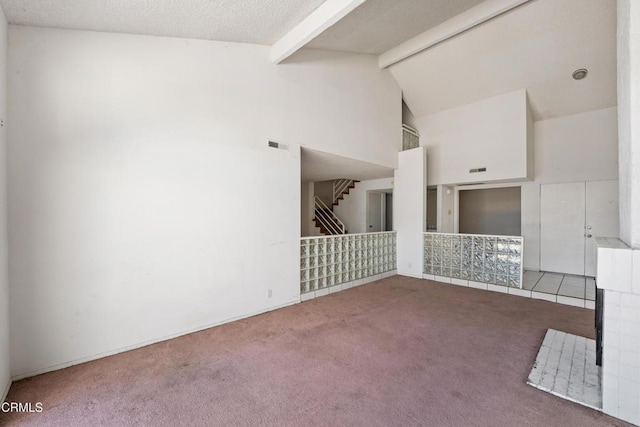 4320 Meridian Ave, Oxnard, CA 93035 - unfurnished living room featuring carpet flooring, beamed ceiling, high vaulted ceiling, and stairway