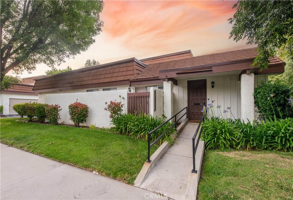 10171 Valley Circle Blvd Unit 1, Chatsworth, CA 91311 - view of front facade with a tiled roof