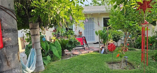 450 W D St, Colton, CA 92324 - view of exterior entry with a yard