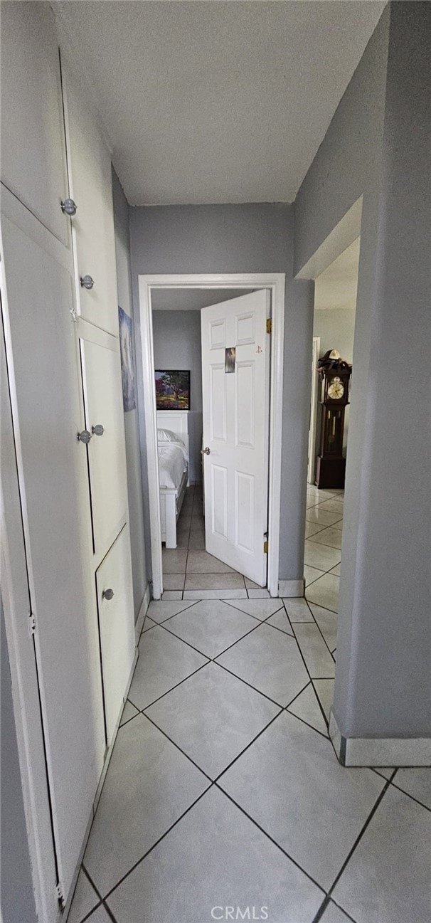 450 W D St, Colton, CA 92324 - corridor with light tile patterned floors and baseboards