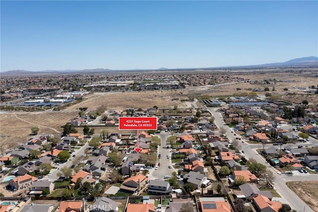 4231 Sage Ct, Palmdale, CA 93552 - aerial overview of property's location with mountains and nearby suburban area