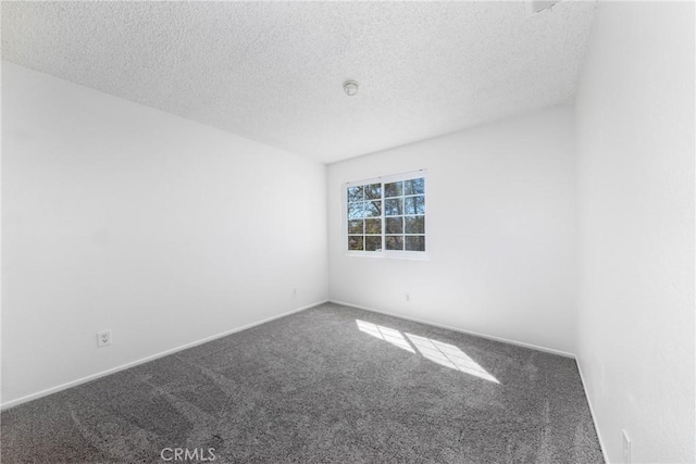 4231 Sage Ct, Palmdale, CA 93552 - unfurnished room featuring carpet, a textured ceiling, and baseboards