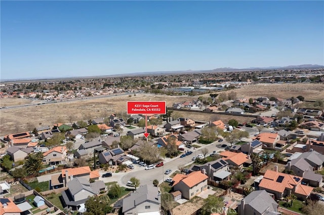 4231 Sage Ct, Palmdale, CA 93552 - aerial view of property's location with a mountainous background and nearby suburban area