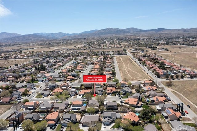 4231 Sage Ct, Palmdale, CA 93552 - aerial overview of property's location with mountains and nearby suburban area