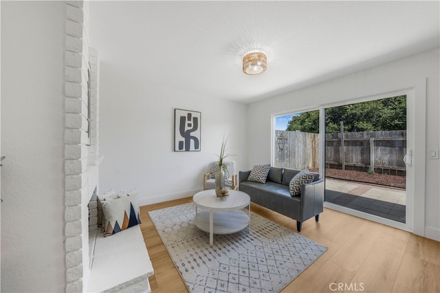 676 N 12th St Unit 21, Grover Beach, CA 93433 - living area featuring wood finished floors and baseboards