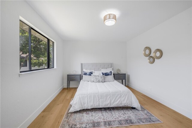 676 N 12th St Unit 21, Grover Beach, CA 93433 - bedroom featuring wood finished floors and baseboards