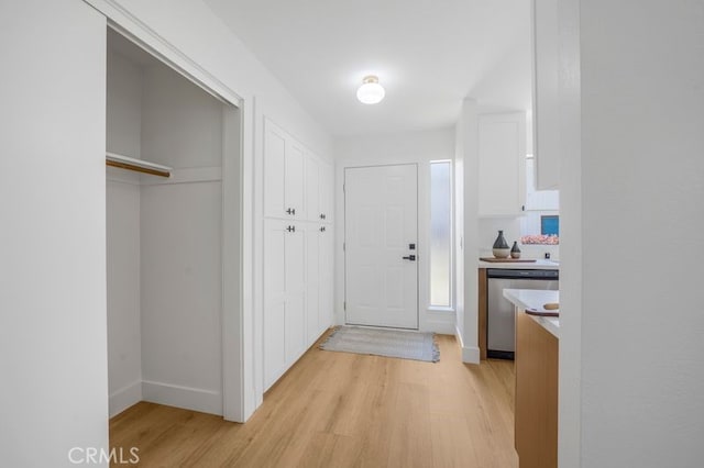676 N 12th St Unit 21, Grover Beach, CA 93433 - entrance foyer with light wood-style floors and baseboards