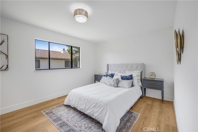 676 N 12th St Unit 21, Grover Beach, CA 93433 - bedroom with baseboards and wood finished floors
