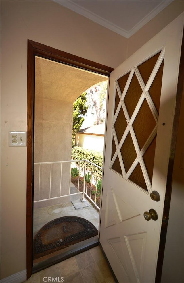 11514 Beverly Blvd, Whittier, CA 90601 - doorway to outside featuring crown molding