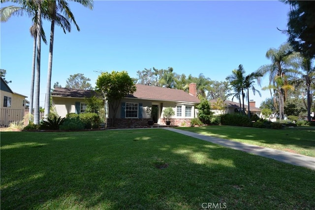 11514 Beverly Blvd, Whittier, CA 90601 - single story home featuring a front lawn, a chimney, and stucco siding
