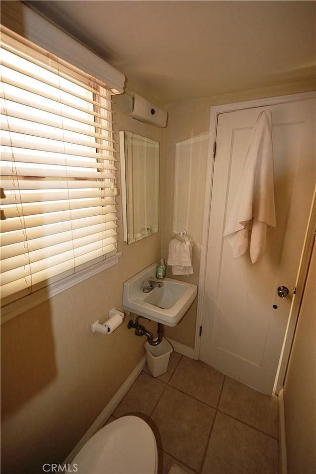 11514 Beverly Blvd, Whittier, CA 90601 - half bathroom with tile patterned floors and healthy amount of natural light