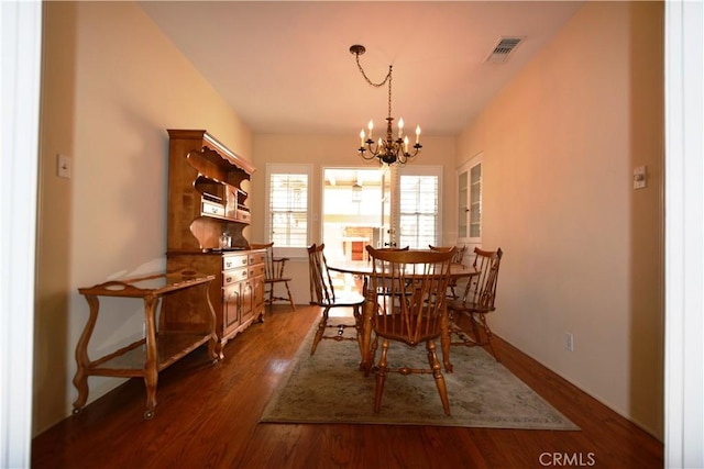 11514 Beverly Blvd, Whittier, CA 90601 - dining space with a chandelier and wood finished floors