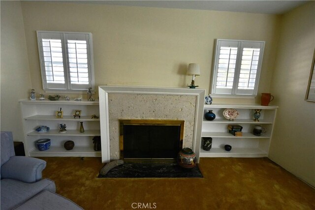 11514 Beverly Blvd, Whittier, CA 90601 - carpeted living area with plenty of natural light and a high end fireplace