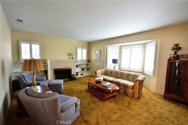 11514 Beverly Blvd, Whittier, CA 90601 - carpeted living room featuring plenty of natural light and a fireplace with flush hearth