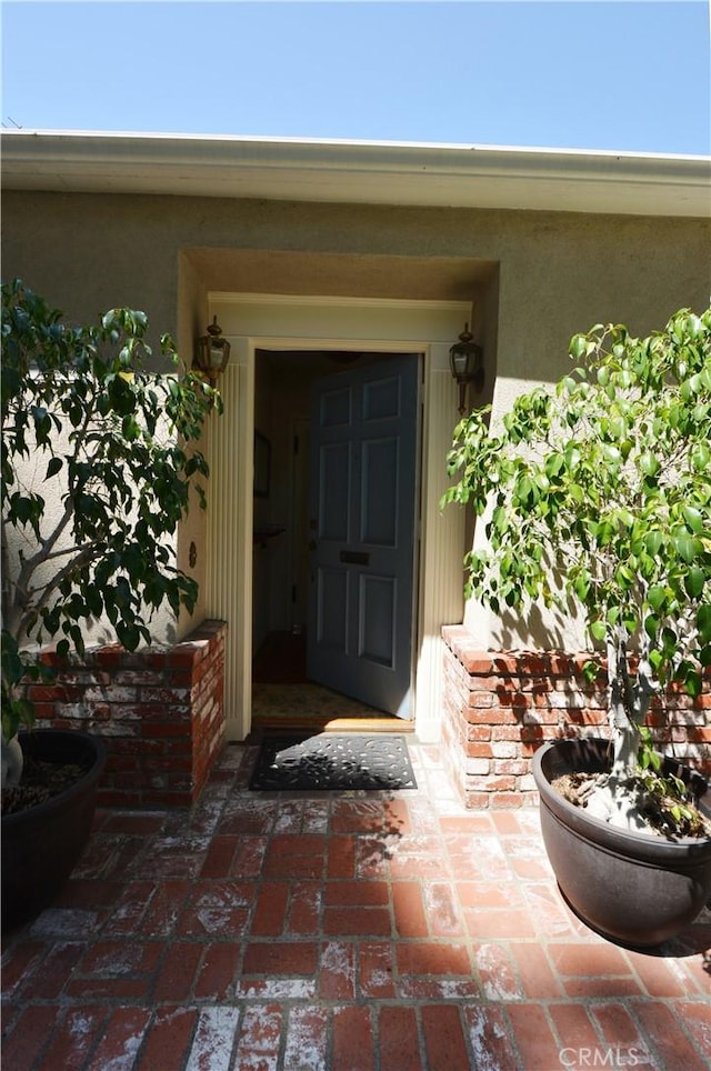 11514 Beverly Blvd, Whittier, CA 90601 - doorway to property featuring stucco siding