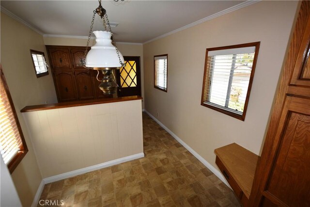 11514 Beverly Blvd, Whittier, CA 90601 - hallway with baseboards, plenty of natural light, and crown molding