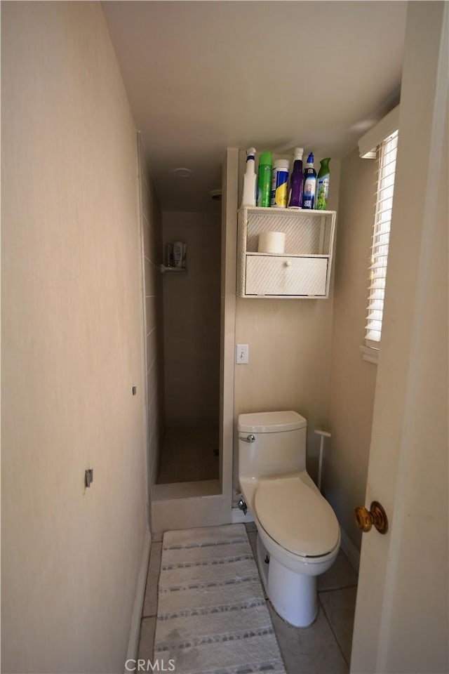 11514 Beverly Blvd, Whittier, CA 90601 - bathroom featuring a stall shower, toilet, and tile patterned floors