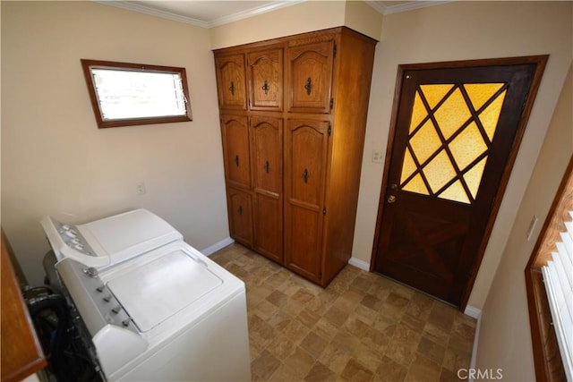 11514 Beverly Blvd, Whittier, CA 90601 - laundry area featuring washing machine and dryer, cabinet space, crown molding, and stone finish flooring