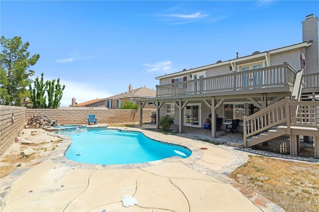 38701 Annette Ave, Palmdale, CA 93551 - view of swimming pool featuring french doors, a fenced backyard, a wooden deck, a patio area, and a pool with connected hot tub