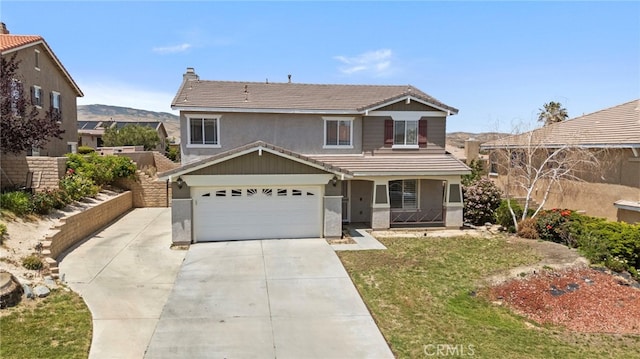 38701 Annette Ave, Palmdale, CA 93551 - traditional-style house with a tile roof, concrete driveway, a garage, stucco siding, and a porch