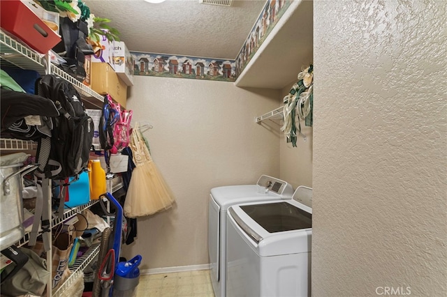 38701 Annette Ave, Palmdale, CA 93551 - washroom featuring washer and dryer, baseboards, a textured ceiling, and tile patterned floors