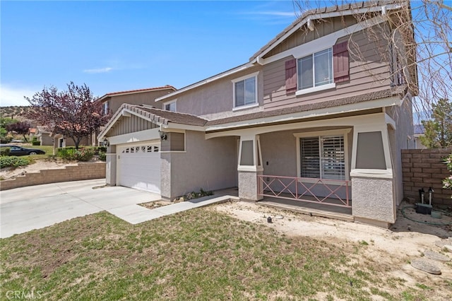 38701 Annette Ave, Palmdale, CA 93551 - view of front of house featuring a porch, a garage, driveway, and stucco siding
