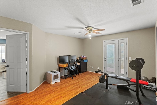 38701 Annette Ave, Palmdale, CA 93551 - office with a ceiling fan, wood finished floors, and a textured ceiling