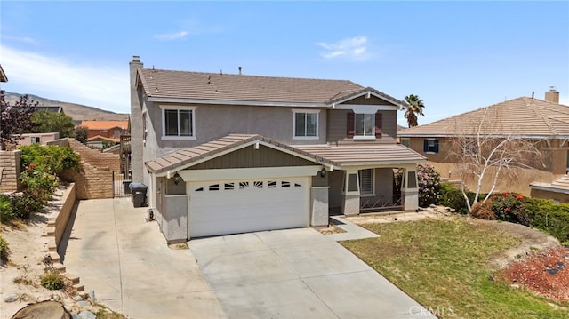 38701 Annette Ave, Palmdale, CA 93551 - traditional home with stucco siding, a garage, concrete driveway, and a tiled roof