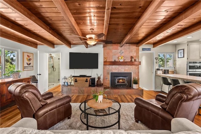 39662 86th St W, Leona Valley, CA 93551 - living area with wood finished floors, a ceiling fan, wood ceiling with exposed beams, baseboards, and recessed lighting
