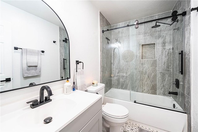 7017 Filkins Ave, Rancho Cucamonga, CA 91701 - full bath with vanity, bath / shower combo with glass door, and toilet