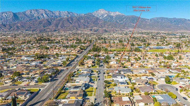 7017 Filkins Ave, Rancho Cucamonga, CA 91701 - view of property location featuring a mountainous background and nearby suburban area