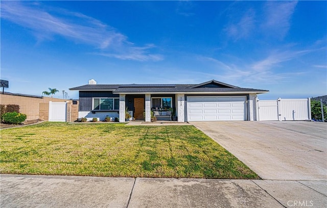 7017 Filkins Ave, Rancho Cucamonga, CA 91701 - ranch-style home with a gate, driveway, roof mounted solar panels, a garage, and a chimney