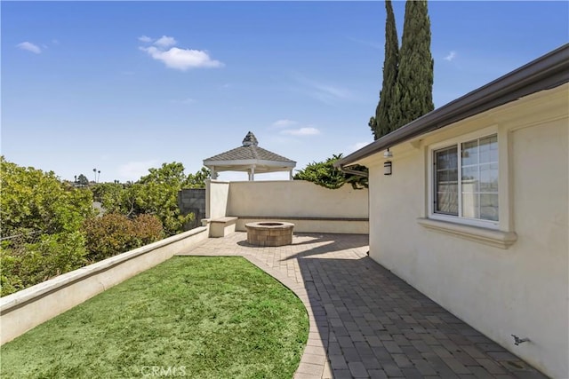 4508 Don Timoteo Dr, Los Angeles, CA 90008 - view of green lawn with an outdoor fire pit, a patio, and a gazebo