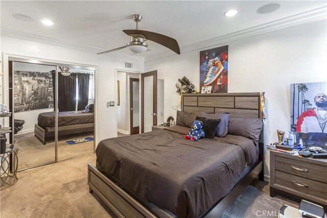 4508 Don Timoteo Dr, Los Angeles, CA 90008 - bedroom with ornamental molding, carpet, ceiling fan, recessed lighting, and a closet